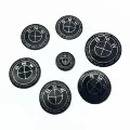 Thunder all black 7-piece set front and rear + 4 56mm hub caps + steering wheel logo