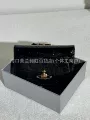 Black and gold lacquered embossed wallet