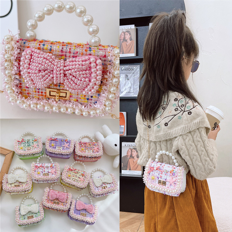 New Child Bags Oblique Satchel Chain Pearl Bag Bow Girls Package Personality Leisure Outstanding Cross-border  新款儿童包包斜挎包链条珍珠手提包蝴蝶结女童包个性休闲出众跨境 New Child Bags Oblique Satchel Chain Pearl Bag Bow Girls Package Personality Leisure Outstanding Cross-border 
