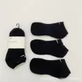White tag thin black [boat socks] three pairs