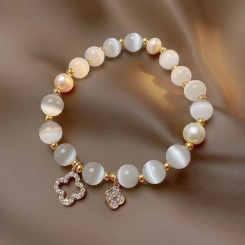 2025 New Imitation Cat's Eye Four-Leaf Clover Glass Bracelet Elastic Rope Niche Pearl Bracelet