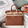 Golden brown with gold hardware