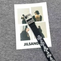 Black background white leopard print cross