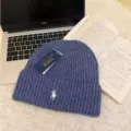 Knitted blue with white label