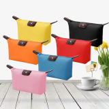 Корейская версия косметички cute dumpling cosmetic bag конфетного цвета, складывающаяся в виде пельменей для мамы, подарочная сумка для хранения туалетных принадлежностей оптом 33 г