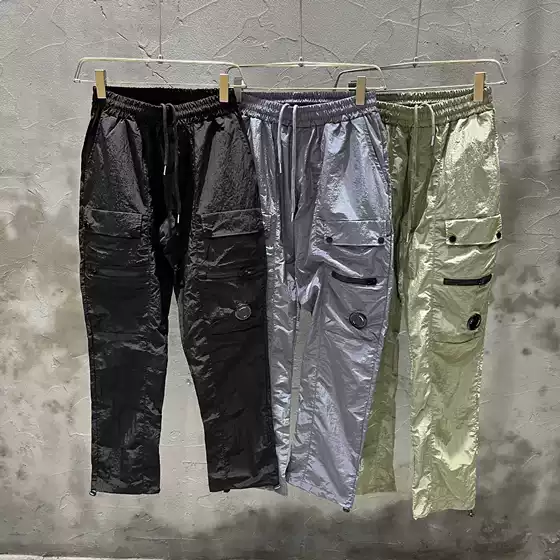 Trendy American style black casual pants for men in autumn, loose fitting and ankle tied casual work pants with elastic waistband, spring and autumn long pants