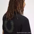 Black print on the back of the t-shirt