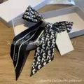 Double-sided letter banner - black