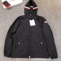 Black windbreaker with colorful stripe detail