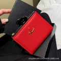 Red gold saturn lychee pattern zipper bag