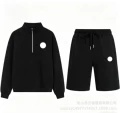Black half-zip shorts-suit