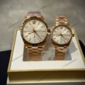 Grayish rose gold - male on the left, female on the right