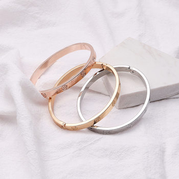 Cross-border new hot titanium steel couple bracelet opening niche high-end fashion titanium steel bracelet factory direct sales