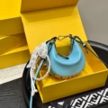 Blue leather shoulder strap charm