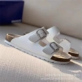 White pebbled sandals
