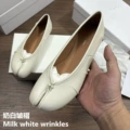 Creamy white flat bottom pleats