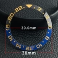 Ceramic gmt black blue circle gold lettering