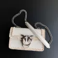 top layer hand-stitched white trumpet