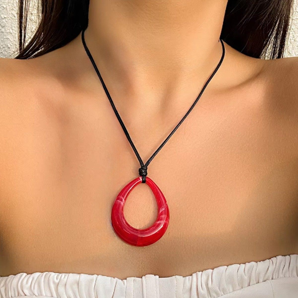 Maillard autumn and winter new hollow water drop necklace women's European and American fashion non-fading wax rope clavicle chain vintage pendant