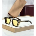 Tortoiseshell framed yellow piece