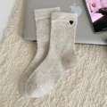 A pair of light gray