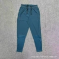 Peacock green track and field trousers