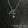 Silver sugar cube-blue diamond double cross necklace