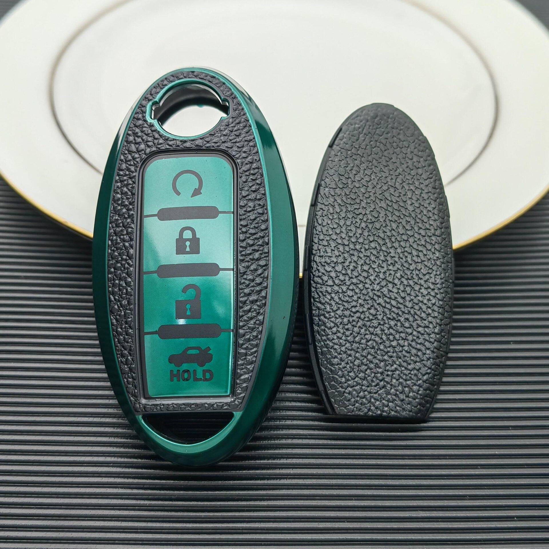 Suitable for Nissan key case new Teana Xuanyi Qida Qijun Blue Bird Tule qashke Nissan key case shell buckle