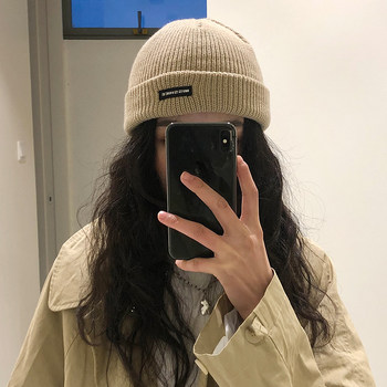 Hat women's autumn and winter warm knitted letter wool hat men's Korean-style hip hop non-Pilling landlord cold hat melon leather hat