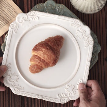 Kiln-modified embossed vintage dinner plate