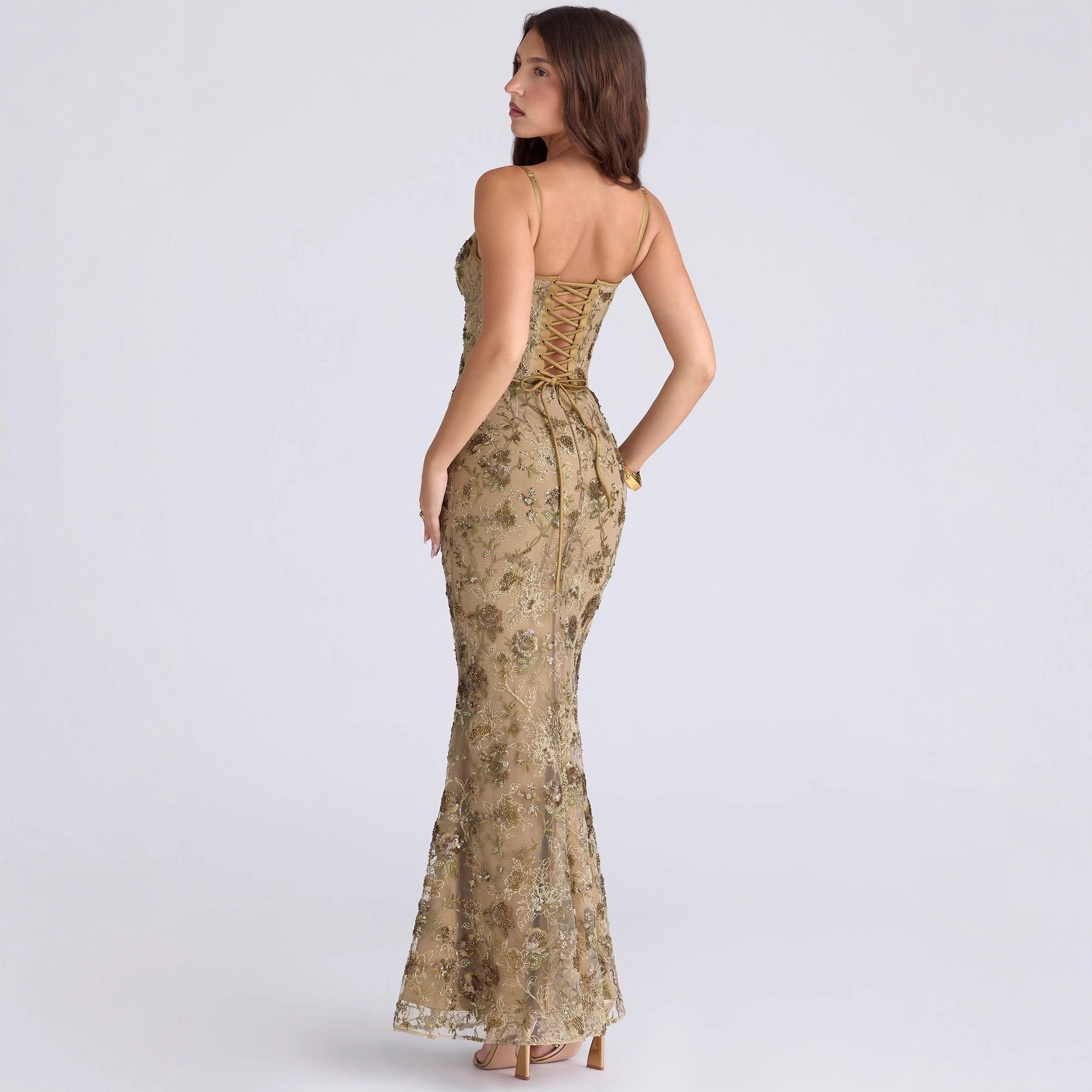 Elegant Sleeveless Backless Dress Low Neckline Tie Detail Chic Design Perfect for Parties and Special Occasions