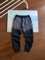 Pants. black and dark gray