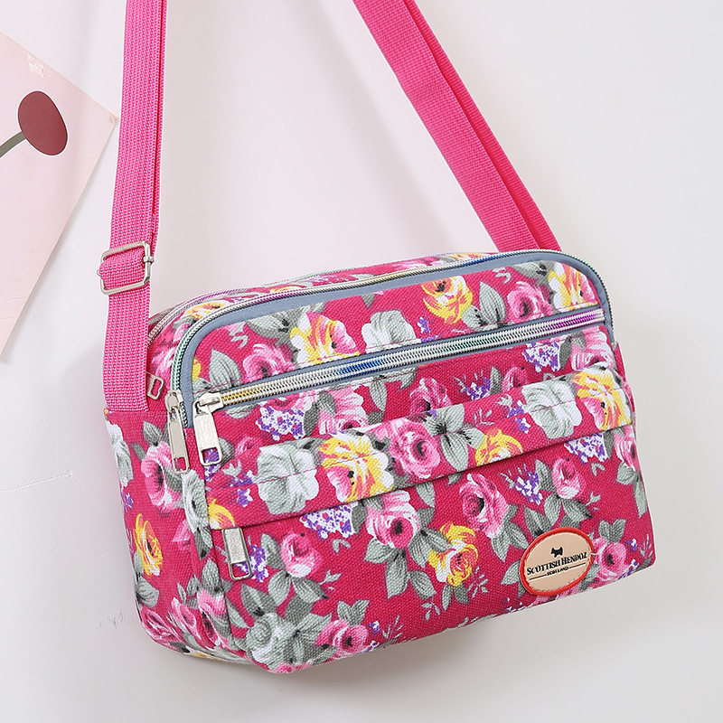 新款妈妈包牛津布女士花布单肩包大容量帆布中老年斜挎包地摊包包