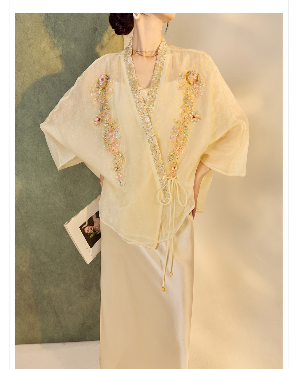 Áo khoác cardigan nữ dáng rộng thêu đính cườm chất liệu tencel phong cách nhẹ nhàng — mơ