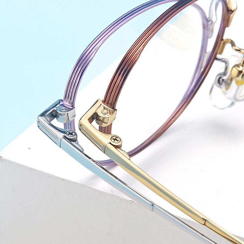 Danyang Eyewear Women's Small Frame Ultra-Light Pure Titanium Eyeglass Frame Ip Two-Tone Electroplating K5015 Wholesale Radiation Protection