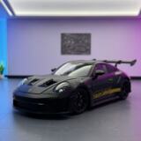 Модель автомобиля Lijiaxin 1:24 Модель спортивного автомобиля из сплава Baoshijie 911GT3RS, украшенная звуковыми и световыми детскими игрушками, выпущенными от имени