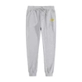 Gray sweatpants with gold eyes