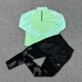 Pattern spliced ​​semi-lengthened sleeves green + high-end spliced ​​pattern trousers black