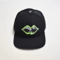 Leather label with large green lips in black