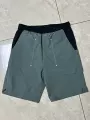Water-repellent color block shorts army green