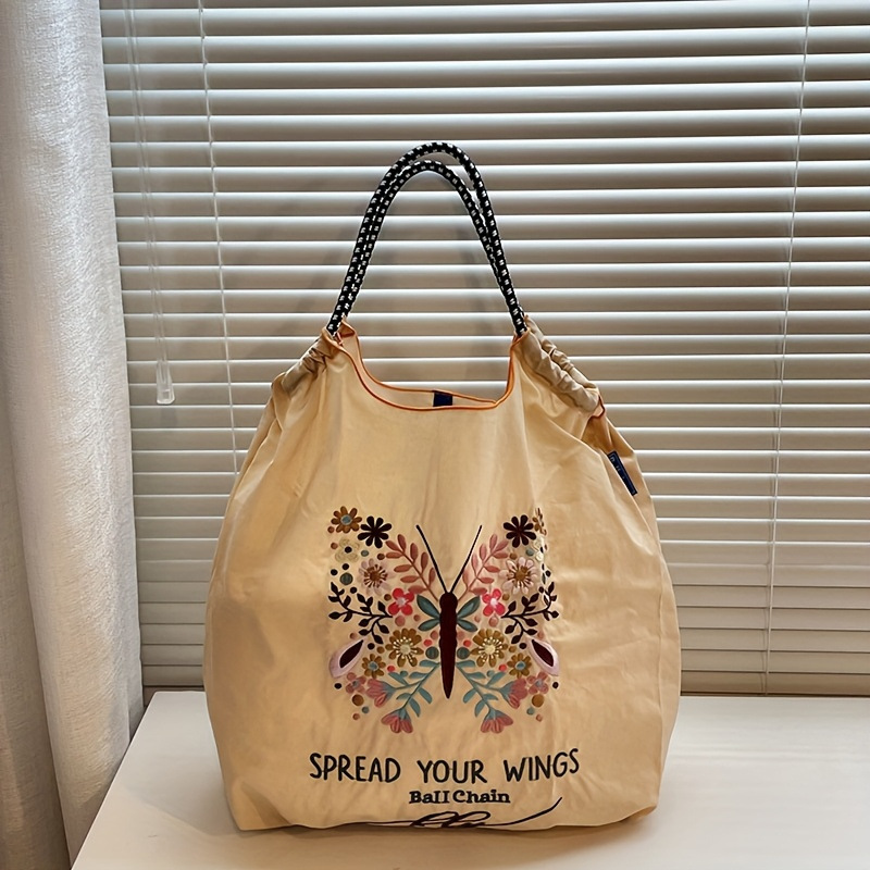 ベージュの植物の蝶