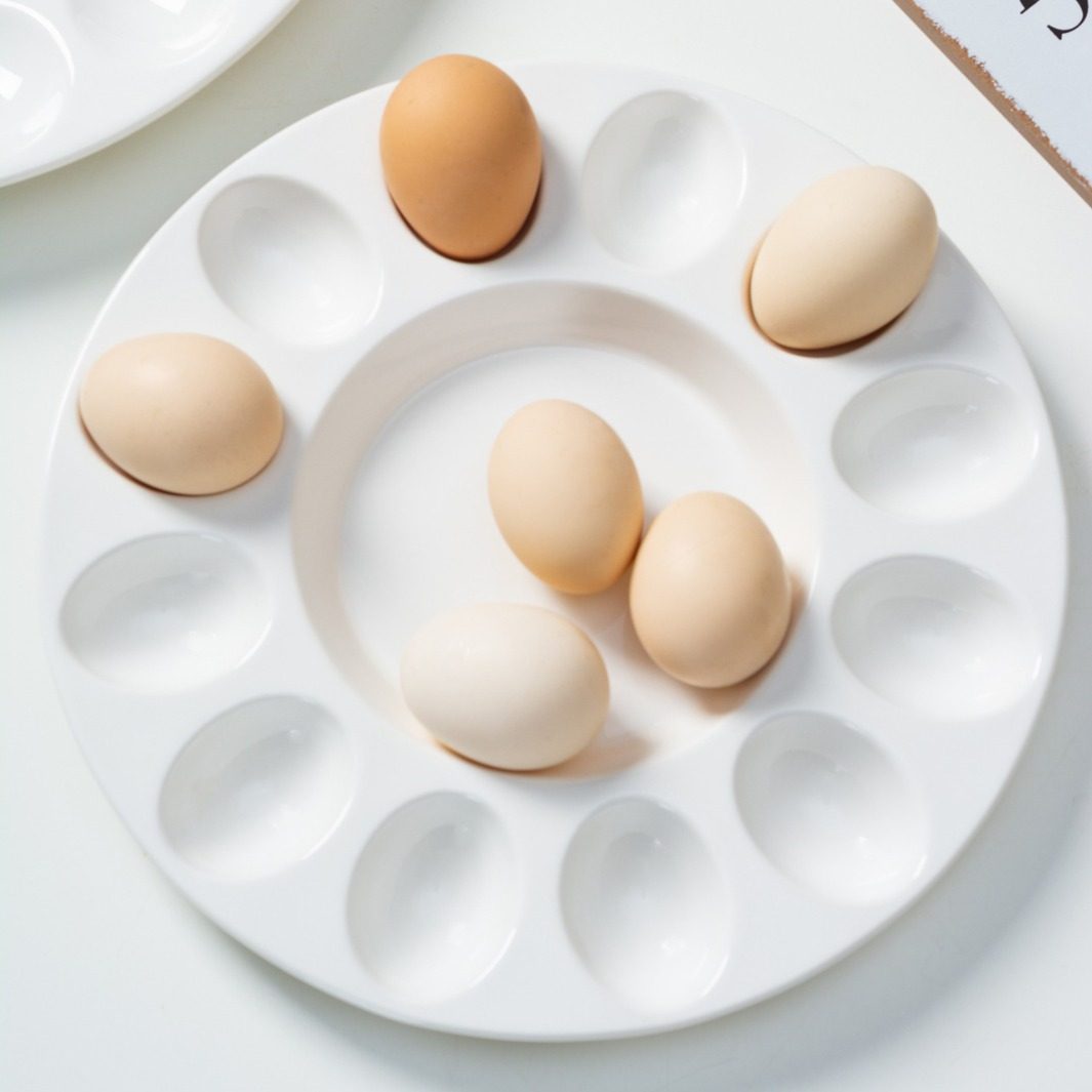 French-style ceramic baking screw plate microwave oven Amazon creative 19-grid egg doll baking plate snail baking plate Christmas ceramic