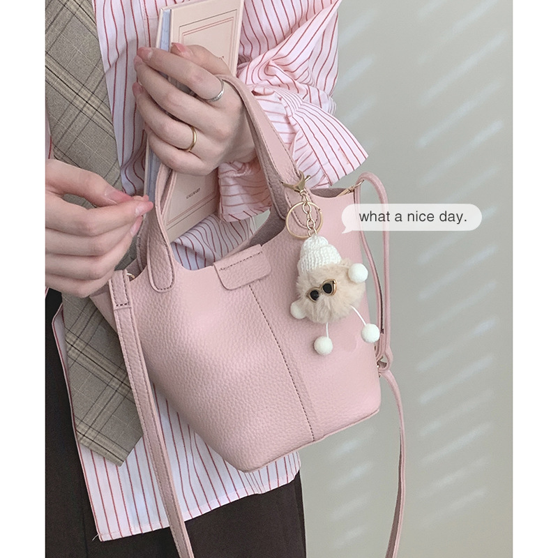 甜美粉色包包女2023春季韩版水桶包，充满复古气息-第4张图片-提都小院