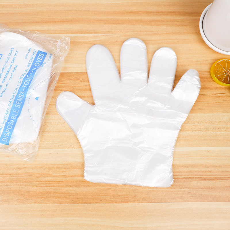 Factory direct food catering baking hair plastic transparent thickened pe gloves 100 wholesale disposable gloves