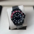Five-bead black watch strap with black and red circles