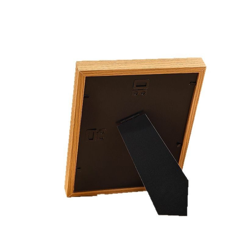 Wooden hollow three-dimensional photo frame table wholesale 5678 inch photo frame A4 wall hanging calligraphy and painting dried flower photo frame
