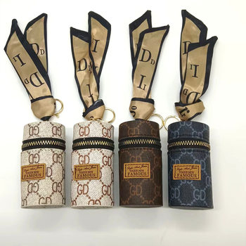 European and American presbyter coin purse 2024 new compact bag pendant earphone bag mouth red envelope mini keychain bag