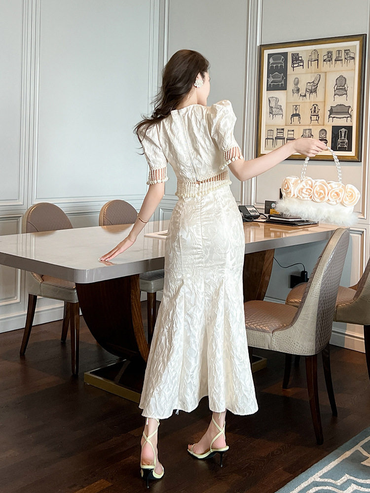 Đầm ôm body nữ cổ tròn tay bồng đuôi cá — [Màu hồng đào]