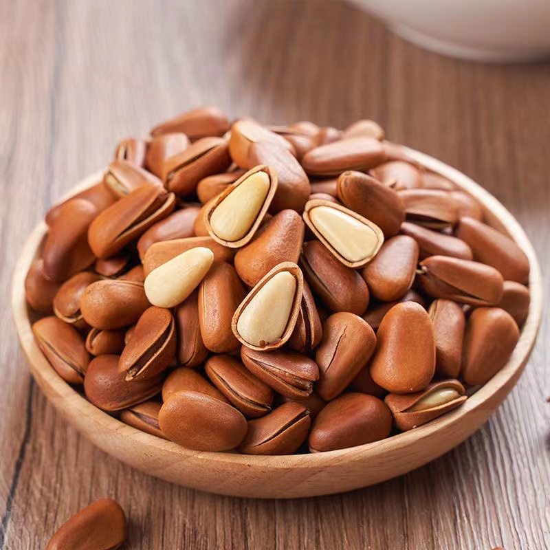 Herbal flavor Northeast Pine nuts 100G open hand-peeled pine nuts full particles casual snacks nuts specialty