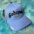 Light blue and black embroidery